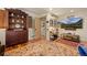 Spacious living room boasts wooden floors, built-in shelving, and ample natural light at 4406 Orofino Pl, Castle Rock, CO 80108
