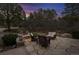 Charming outdoor stone patio with comfortable seating and peaceful surroundings, perfect for relaxing and entertaining at 4406 Orofino Pl, Castle Rock, CO 80108