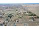 View of a rural neighborhood and surrounding open space with mountains in the distance at 12337 2Nd St, Parker, CO 80134