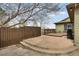 A concrete patio provides backyard outdoor space with a wooden privacy fence at 12337 2Nd St, Parker, CO 80134