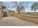 Open backyard with brick retaining wall and convenient stairway access to upper yard at 12337 2Nd St, Parker, CO 80134