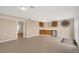 Large basement features tile floors and a kitchenette with wooden cabinets at 12337 2Nd St, Parker, CO 80134