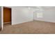 The room features carpet flooring and white walls with a doorway at 12337 2Nd St, Parker, CO 80134