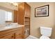 This bathroom features a wood vanity with storage and a light paint color at 12337 2Nd St, Parker, CO 80134