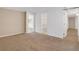 The room features carpet flooring and multiple doorways with white trim at 12337 2Nd St, Parker, CO 80134