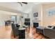 Cozy living room features a fireplace, vaulted ceilings, wood floors and an open layout at 2838 Cascade Creek Dr, Lafayette, CO 80026