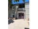Exterior view of the apartment building entrance with dual doors and a welcoming facade at 7346 S Xenia Cir # A, Centennial, CO 80112