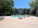 Community pool surrounded by lounge chairs, offering a perfect spot for relaxation and recreation at 7346 S Xenia Cir # A, Centennial, CO 80112