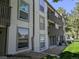 Exterior view of the apartment building featuring well-maintained siding and inviting balconies at 7346 S Xenia Cir # A, Centennial, CO 80112