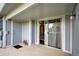 This is a patio with a sliding glass door, a storage closet, and a serene outdoor living space at 7346 S Xenia Cir # A, Centennial, CO 80112