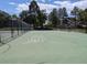 View of a tennis court with playground games area painted on the green surface at 7346 S Xenia Cir # A, Centennial, CO 80112