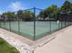 Exterior view of the community tennis courts with well-maintained green playing surfaces at 7346 S Xenia Cir # A, Centennial, CO 80112