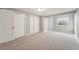 Cozy bedroom with neutral carpeting, ample closet space, and a bright window at 5243 Union Ct # 4, Arvada, CO 80002
