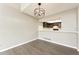 Dining area features hardwood floors, modern lighting and seamless flow to kitchen at 5243 Union Ct # 4, Arvada, CO 80002
