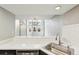 Spacious kitchen featuring a breakfast bar that flows into an open and airy living area at 5243 Union Ct # 4, Arvada, CO 80002