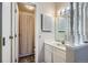 Bathroom with single sink vanity and shower/tub at 3550 S Harlan St # 138, Denver, CO 80235