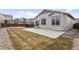 Backyard featuring a concrete patio and gravel at 968 Honey Berry Ct, Elizabeth, CO 80107