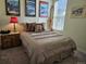 Comfortable bedroom featuring natural light from the window and mountain themed decor at 968 Honey Berry Ct, Elizabeth, CO 80107