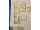 Detailed floor plan showcasing the layout of the home, including the kitchen, bedrooms, and garage at 968 Honey Berry Ct, Elizabeth, CO 80107