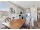 Eat-in kitchen with stainless steel appliances and gray cabinets at 968 Honey Berry Ct, Elizabeth, CO 80107