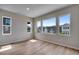 Bedroom featuring three large windows offering plenty of natural light at 8581 Eckley St, Littleton, CO 80125