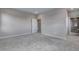 Neutral bedroom features carpet floors, recessed lights, and ensuite bathroom access at 8581 Eckley St, Littleton, CO 80125