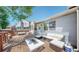Backyard patio with modern furniture at 11560 River Run Cir, Commerce City, CO 80640