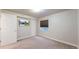 Bedroom with carpet, a bright window and TV for ultimate relaxation at 11560 River Run Cir, Commerce City, CO 80640