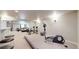 Spacious home gym featuring exercise equipment at 11560 River Run Cir, Commerce City, CO 80640