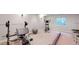 Home gym featuring carpet and exercise equipment at 11560 River Run Cir, Commerce City, CO 80640