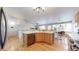 Spacious kitchen area with lots of light and stainless-steel appliances at 11560 River Run Cir, Commerce City, CO 80640