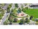 A lovely park with trees, play equipment and a paved walking path is available to the community at 11560 River Run Cir, Commerce City, CO 80640