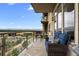 Private balcony with mountain views and comfortable seating at 5455 Landmark Pl # 604, Greenwood Village, CO 80111