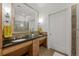 Double vanity bathroom with granite countertops and a large shower at 5455 Landmark Pl # 604, Greenwood Village, CO 80111