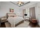 Bright bedroom with a workspace and ample closet space at 5455 Landmark Pl # 604, Greenwood Village, CO 80111