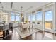 Spacious dining area with hardwood floors and access to balcony at 5455 Landmark Pl # 604, Greenwood Village, CO 80111