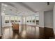 Open concept kitchen with island and hardwood floors at 5455 Landmark Pl # 604, Greenwood Village, CO 80111
