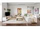 Bright living room with hardwood floors, comfy sofas, and large windows at 5455 Landmark Pl # 604, Greenwood Village, CO 80111