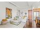 Elegant living room with a cozy sofa and statement art at 5455 Landmark Pl # 604, Greenwood Village, CO 80111
