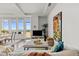 Bright living room with large windows and city views at 5455 Landmark Pl # 604, Greenwood Village, CO 80111