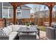 Backyard patio featuring a pergola with outdoor furniture and grill at 1461 Hickory Ct, Erie, CO 80516