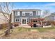 Expansive backyard features a patio, pergola, and lush lawn, perfect for outdoor entertaining and relaxation at 1461 Hickory Ct, Erie, CO 80516