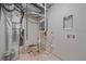 Unfinished basement mechanical room with essential utilities, showcasing functionality and potential at 2430 Ames St, Edgewater, CO 80214