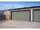 A detached two car garage with side wood fence at 2430 Ames St, Edgewater, CO 80214