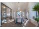 Dining room with large windows and modern decor that connects to the rest of the house at 93 Glenmoor Dr, Englewood, CO 80113