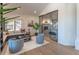 Inviting living area with comfortable seating, natural light, and glass doors, providing a cozy and stylish space at 93 Glenmoor Dr, Englewood, CO 80113