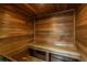 Inviting wooden sauna with built-in bench, promising relaxation and wellness at 93 Glenmoor Dr, Englewood, CO 80113
