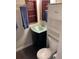 Bathroom with frosted glass sink, dark wood cabinet and modern fixtures at 6585 W 84Th Way # 109, Arvada, CO 80003