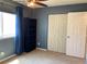 Bedroom with spacious closet, and built-in shelving at 6585 W 84Th Way # 109, Arvada, CO 80003