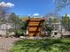 Welcoming community garden entrance with pergola, seating, and landscaping for neighborhood enjoyment at 6585 W 84Th Way # 109, Arvada, CO 80003